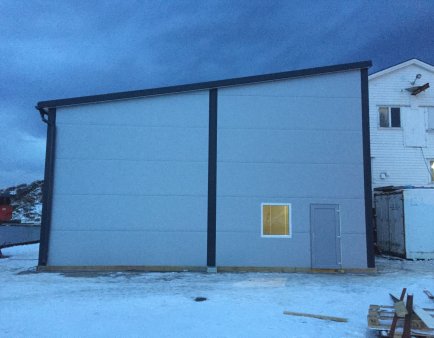 industrial-gate-opened-by-hand-one-winged.jpg
